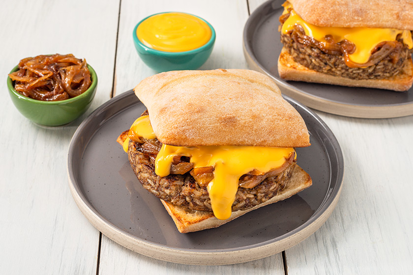 vegan mushroom burger with cheese sauce